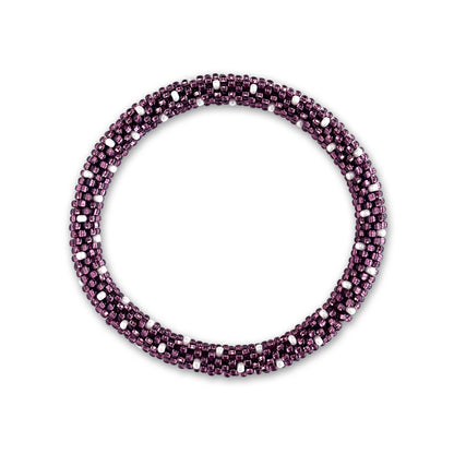 Purple beaded bracelet with white accents on a white background