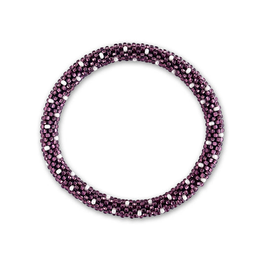 Purple beaded bracelet with white accents on a white background