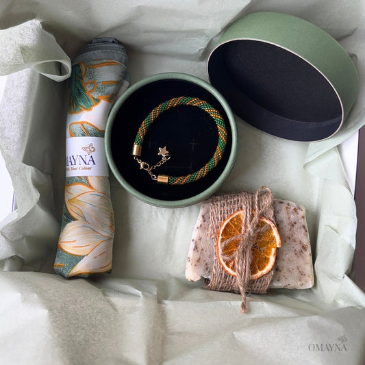 Jewellery set with a bracelet, soap, and scarf in a gift box