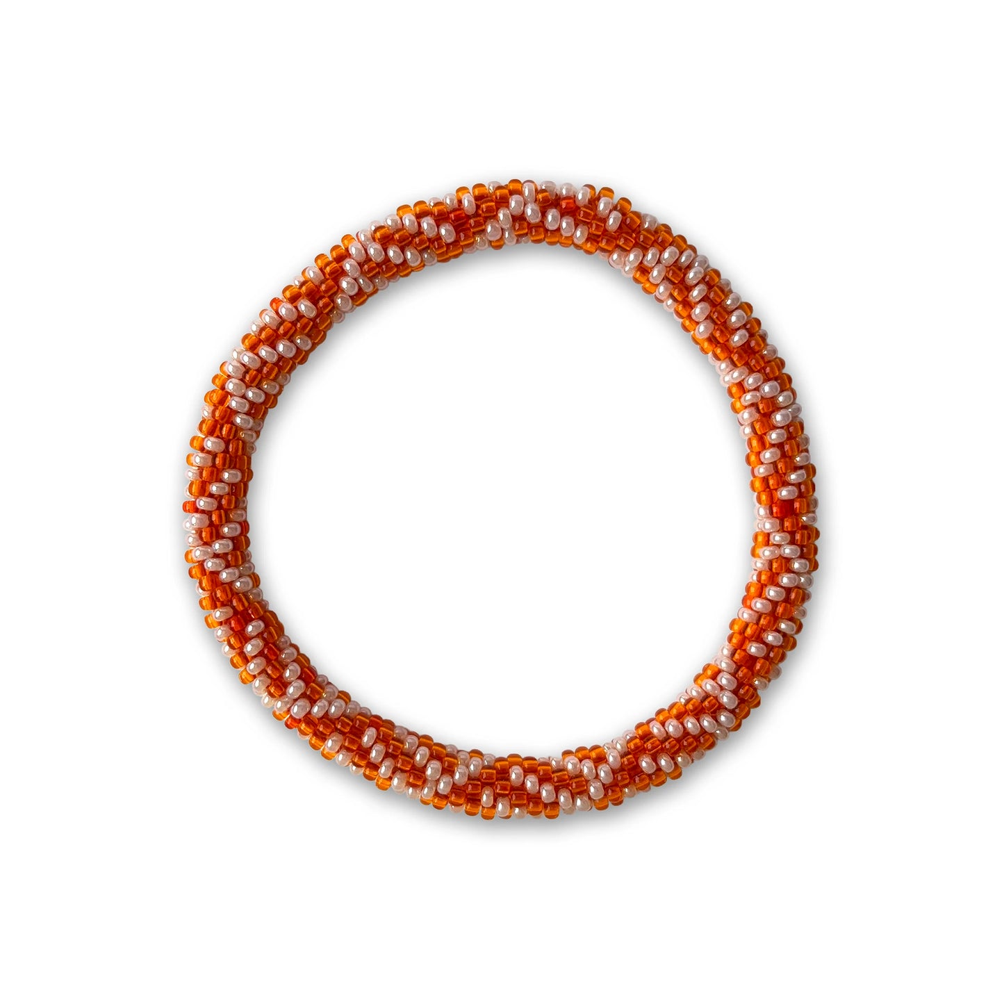 Bracelet with orange and white beads on a white background - part of the artisan soap set