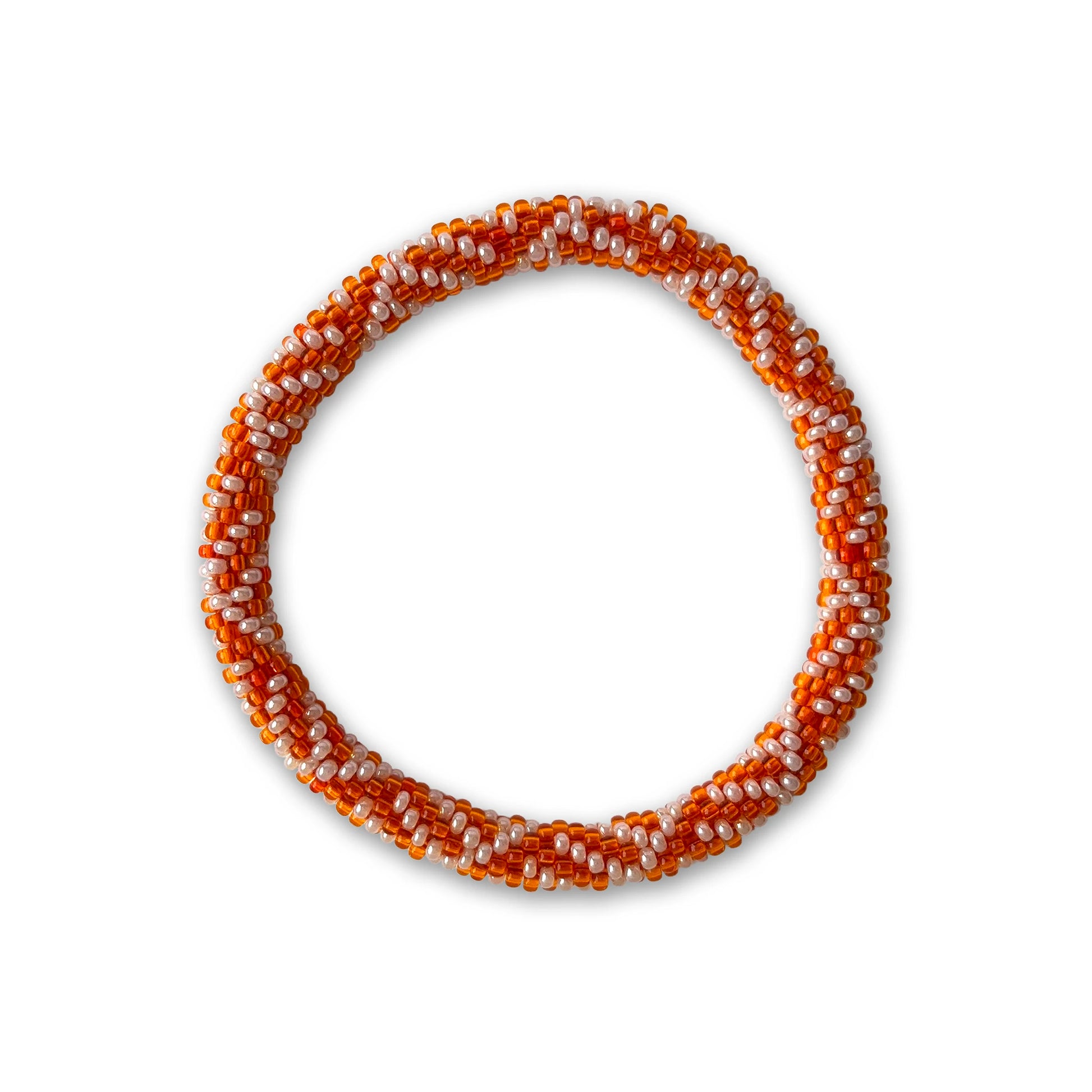 Bracelet with orange and white beads on a white background - part of the artisan soap set