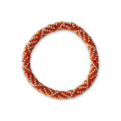 Bracelet with orange and white beads on a white background - part of the artisan soap set
