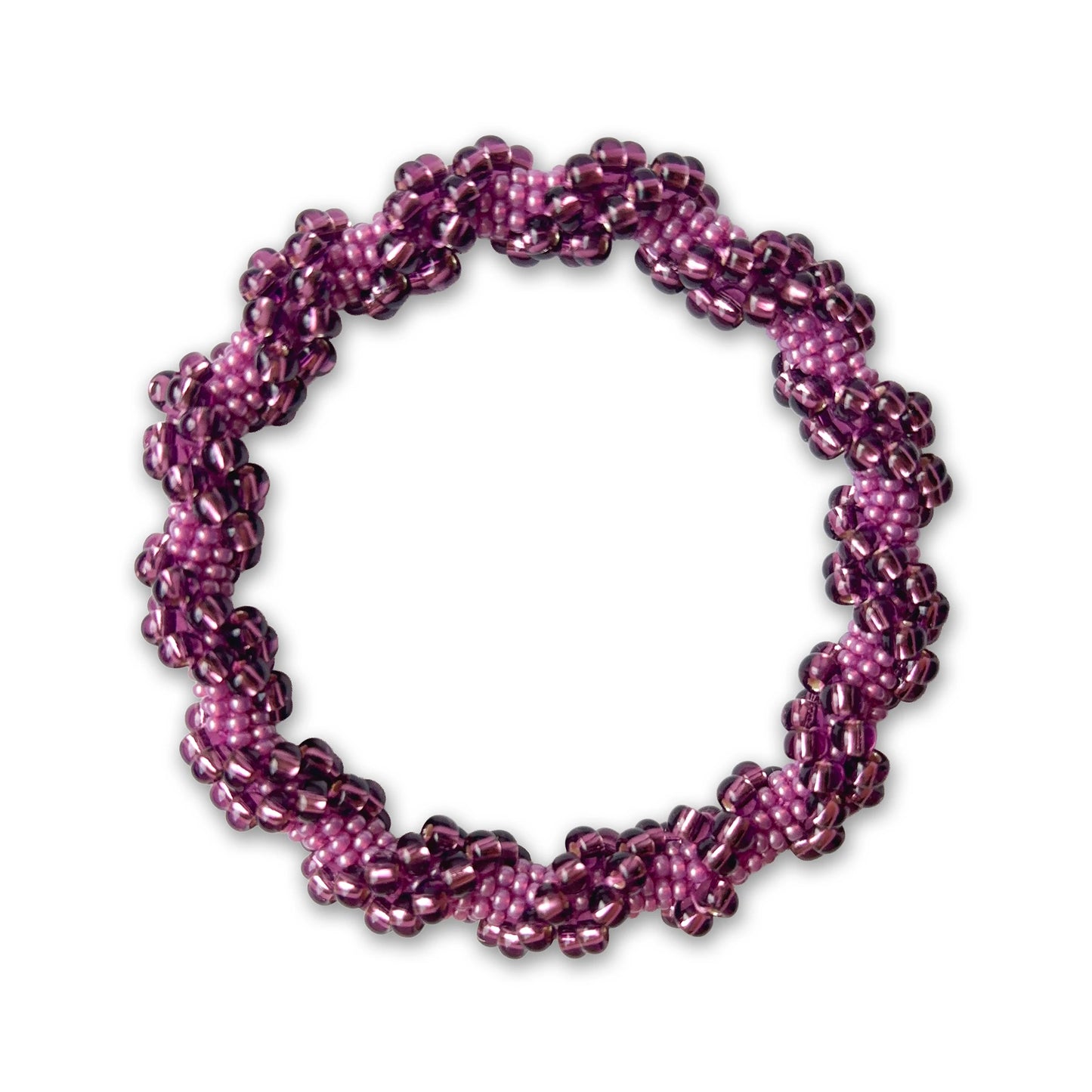 Purple and pink beaded bracelet on a white background