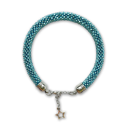 Light blue beaded bracelet with a star charm on a white background