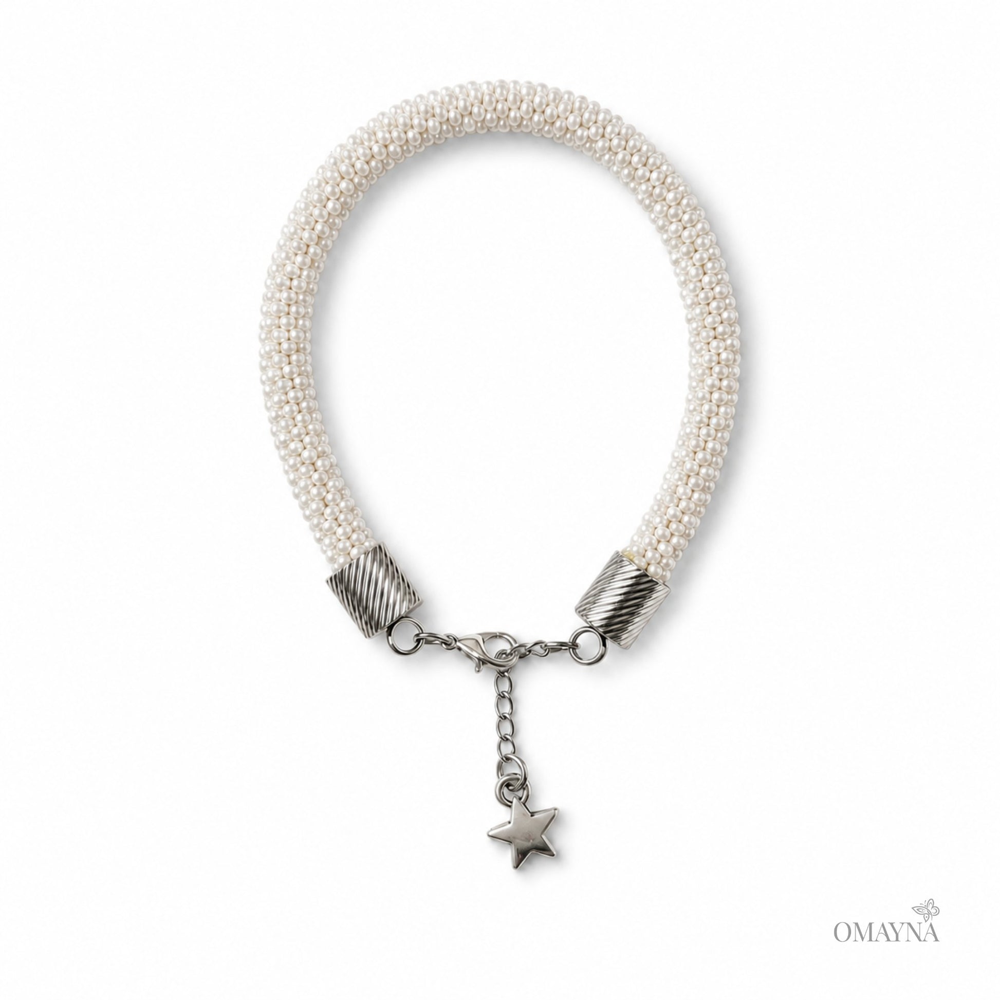 Pearl bracelet with silver beads and a star charm on a white background