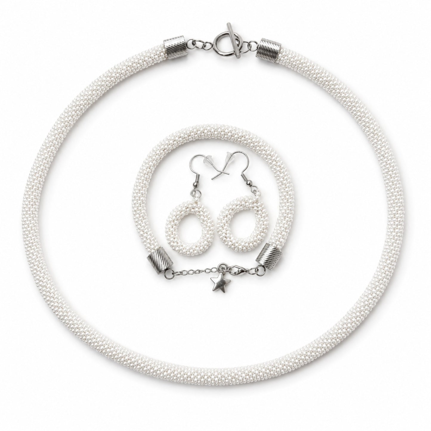 White beaded necklace with silver clasp and star charm, accompanied by matching earrings on a white background.