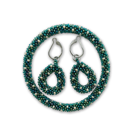 Ivy set -  beaded bracelet and earrings on a white background in green with pearls accents