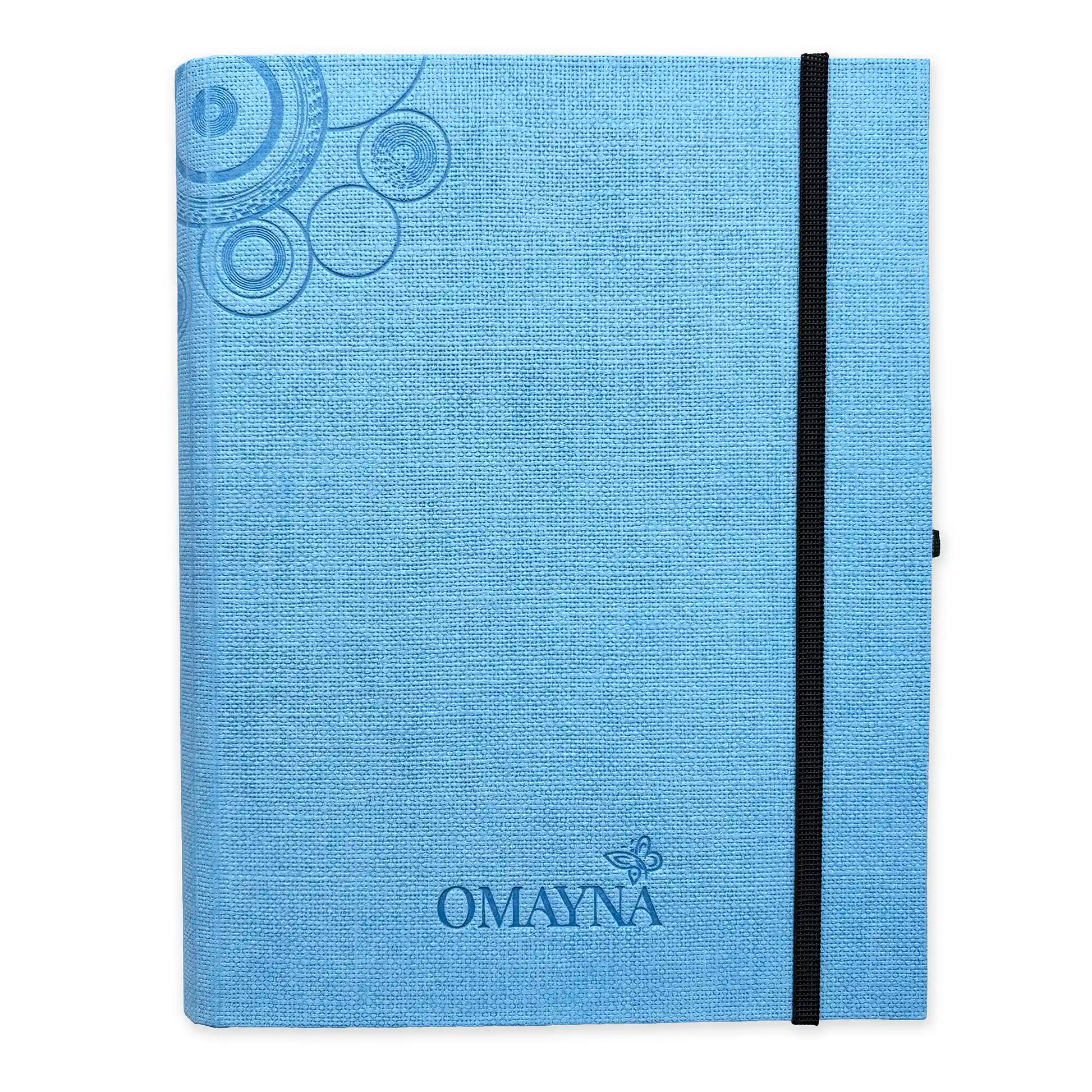 Light Blue notebook with black strap closure on a white background with Omayna logo