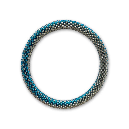 Multistrand bracelet with blue and silver beads on a white background
