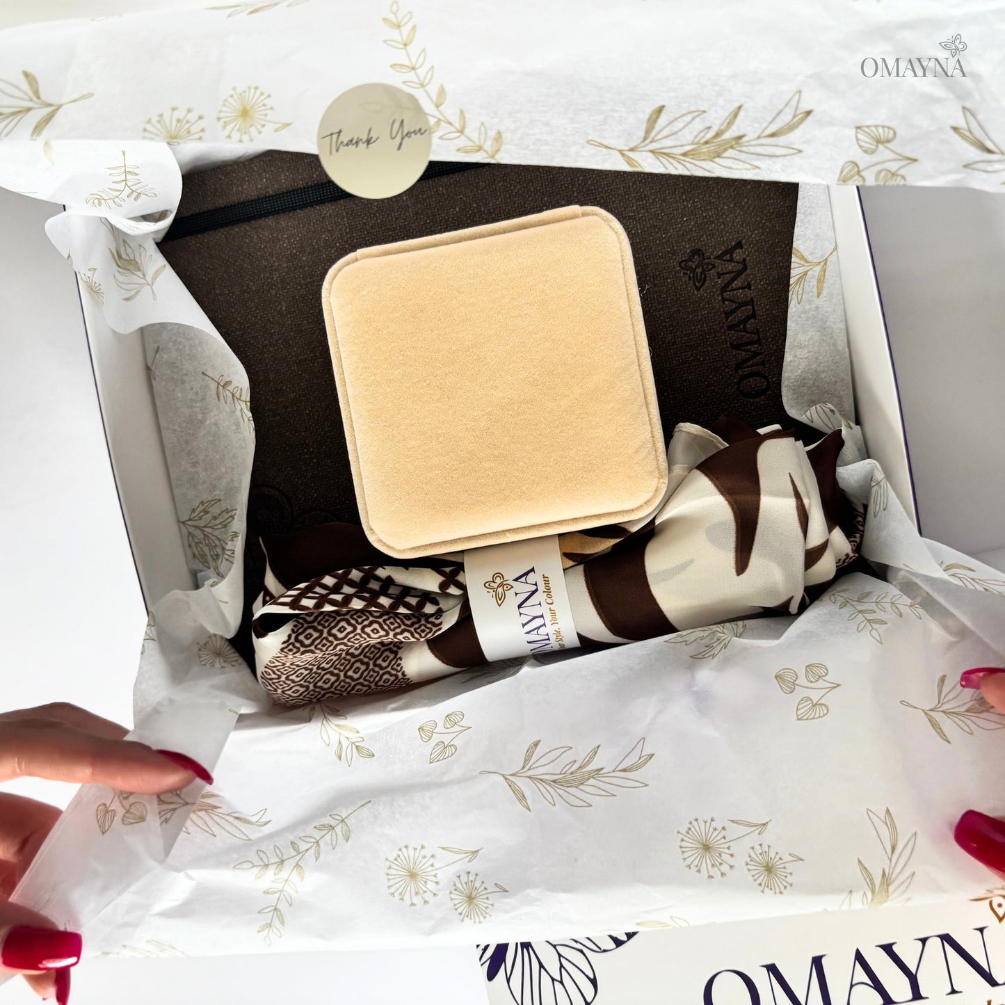 Jewelry box with a decorative interior in a branded box