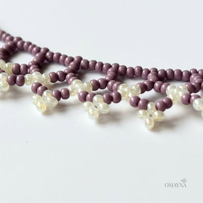 Una beaded necklace in soft purple and cream tones - details